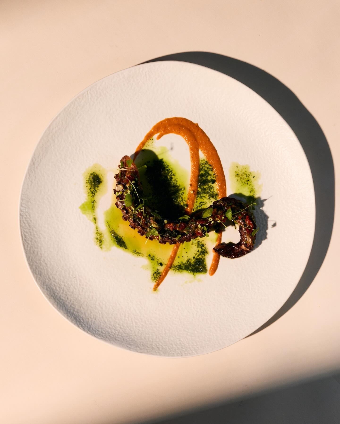 A carefully presented dish from AQUA