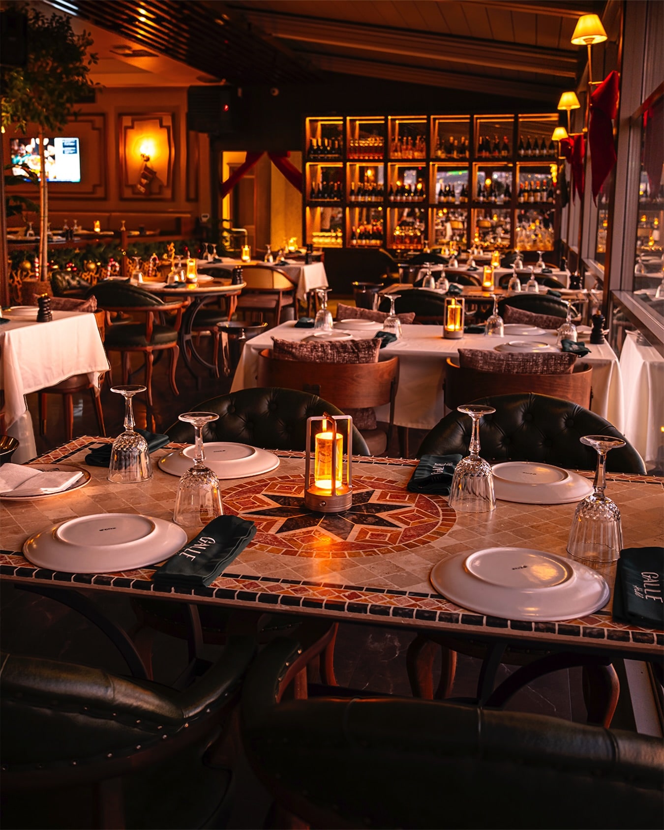 The warmly lit main dining room at Galle Hill