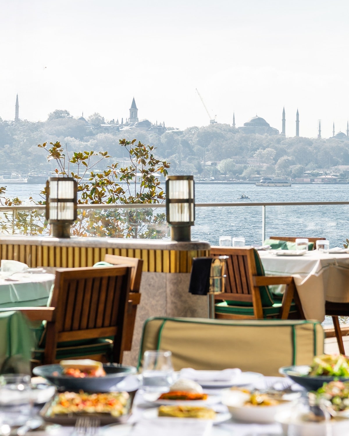 a view of the food and setting at liman istanbul