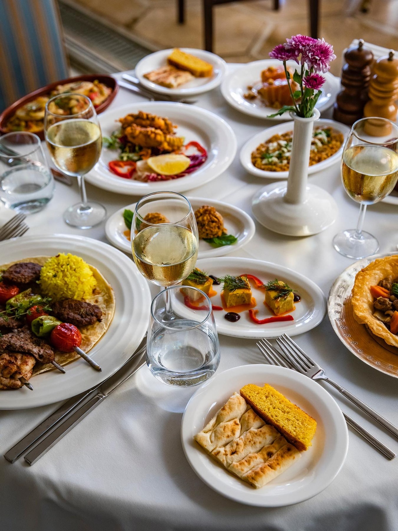 An evening table set on the Matbah terrace