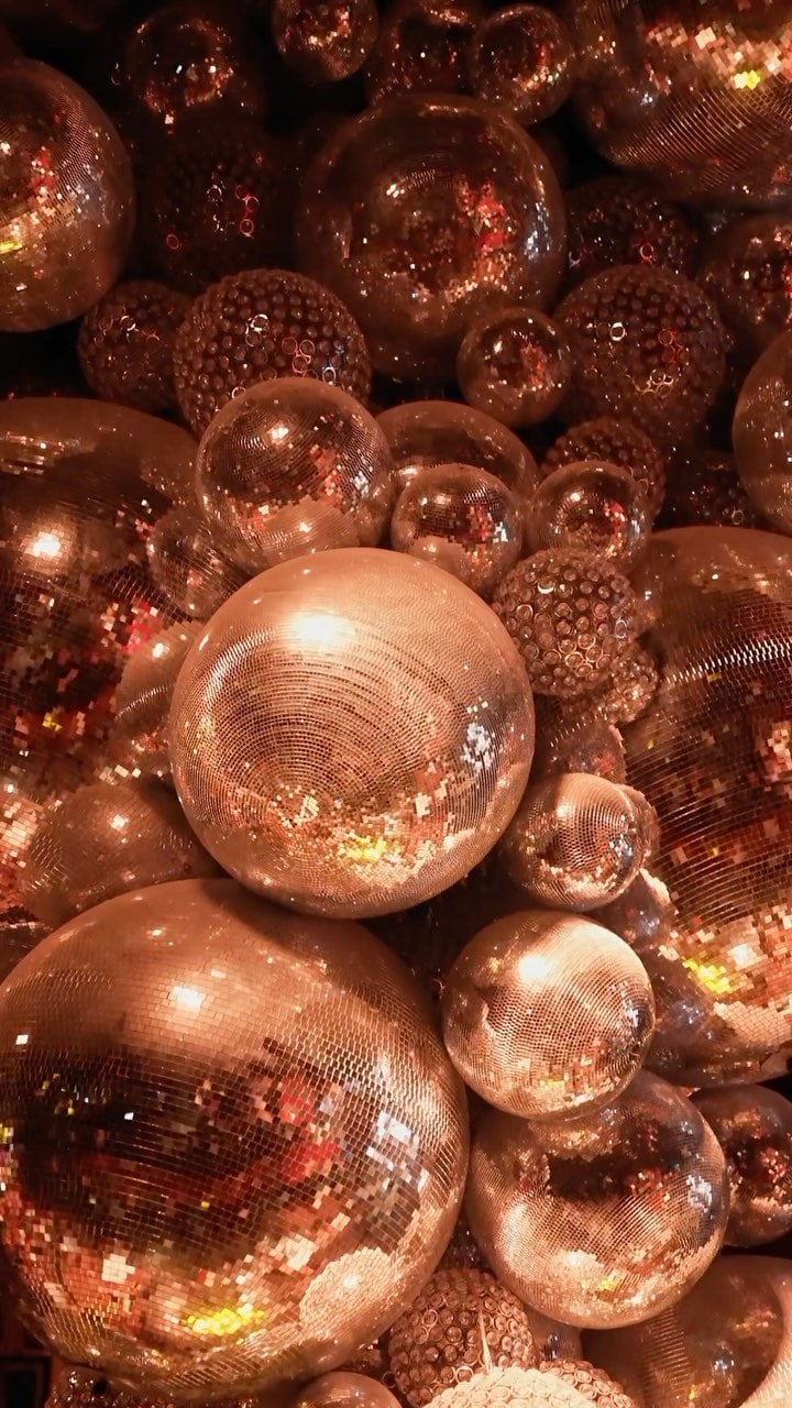The copper-toned disco-ball installation at Mondaine de Pariso Istanbul