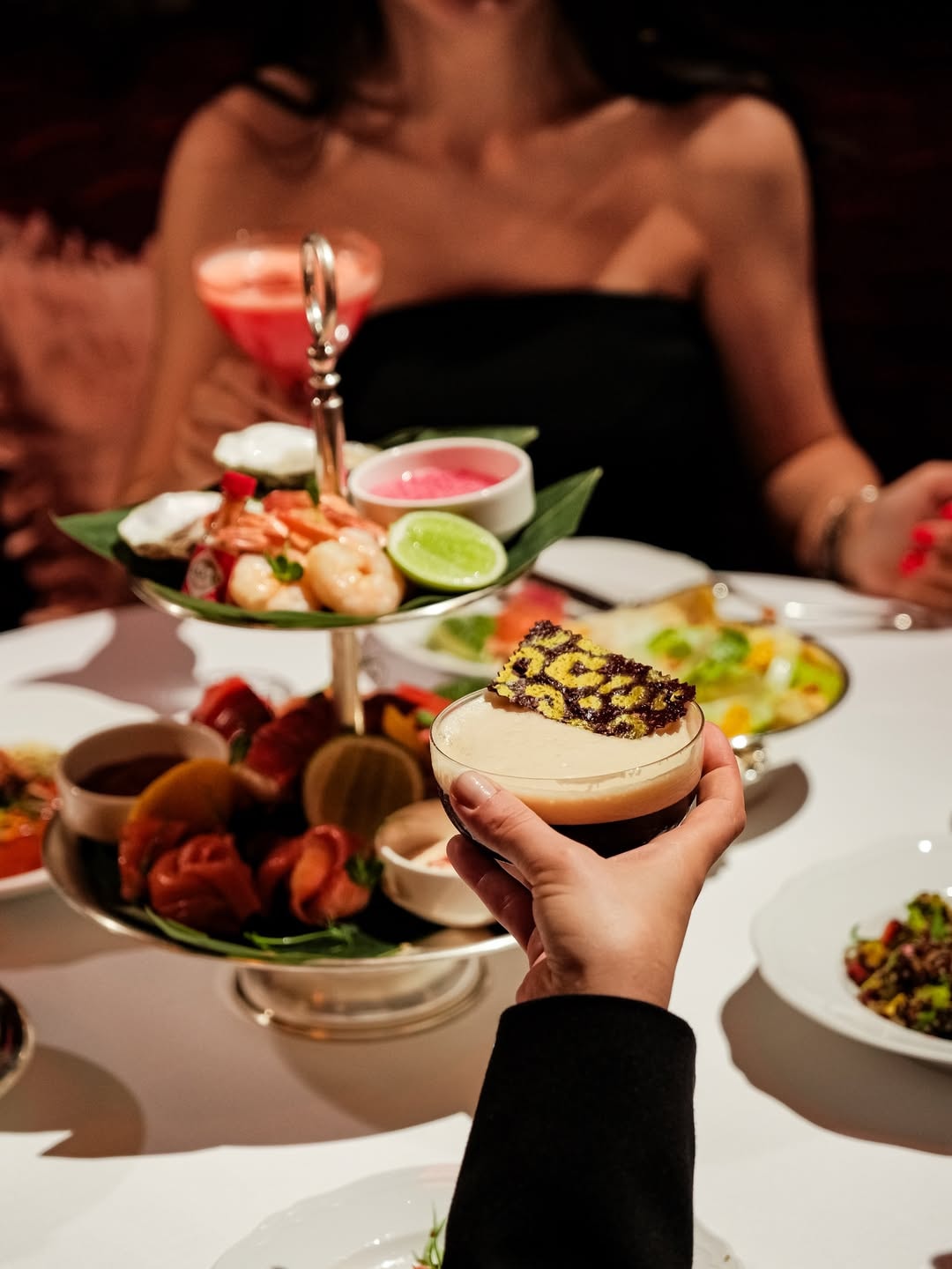 A sharing table of seafood and cocktails at Mondaine de Pariso Istanbul