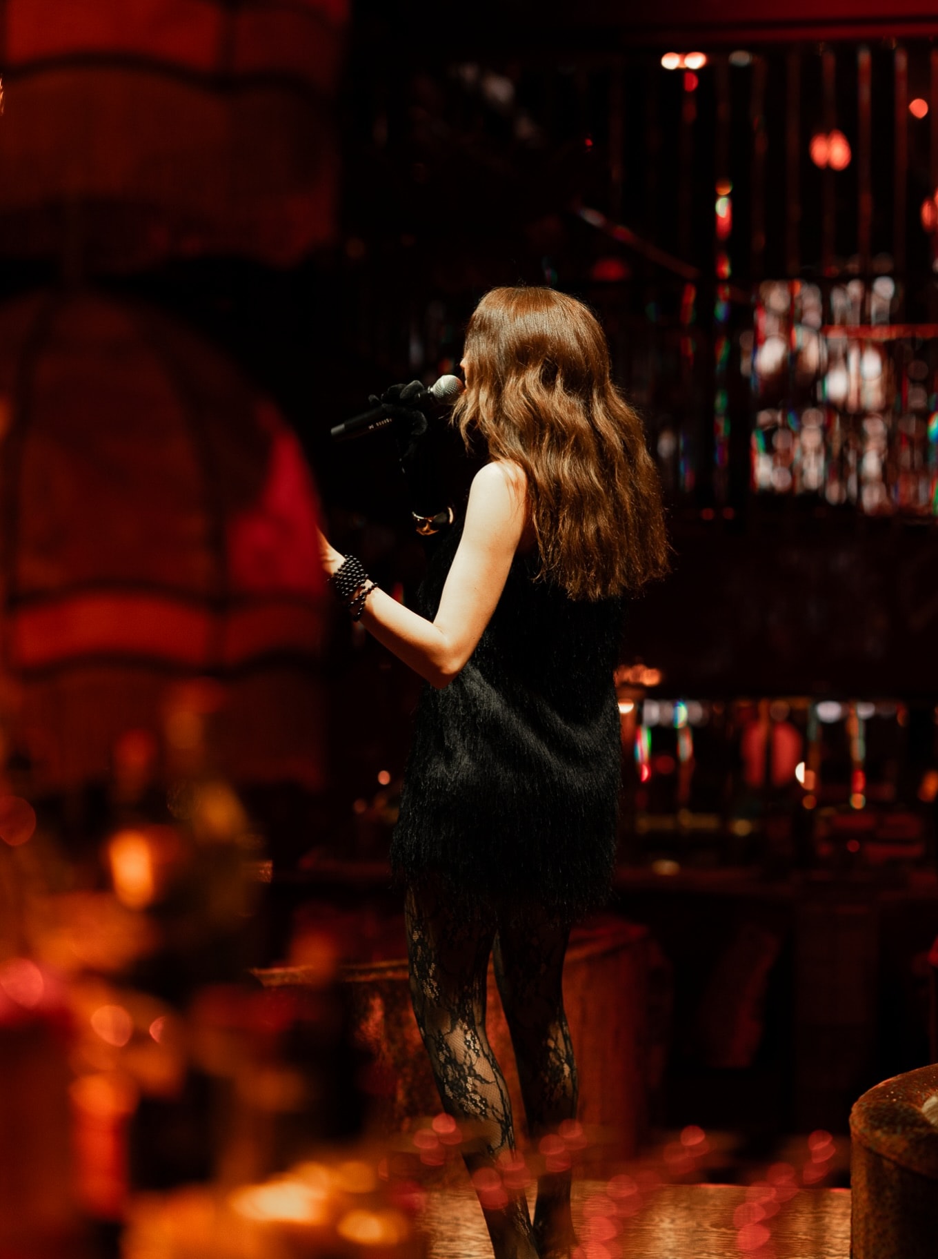 A face-free atmosphere view of Mondaine de Pariso Istanbul's low-lit dining room