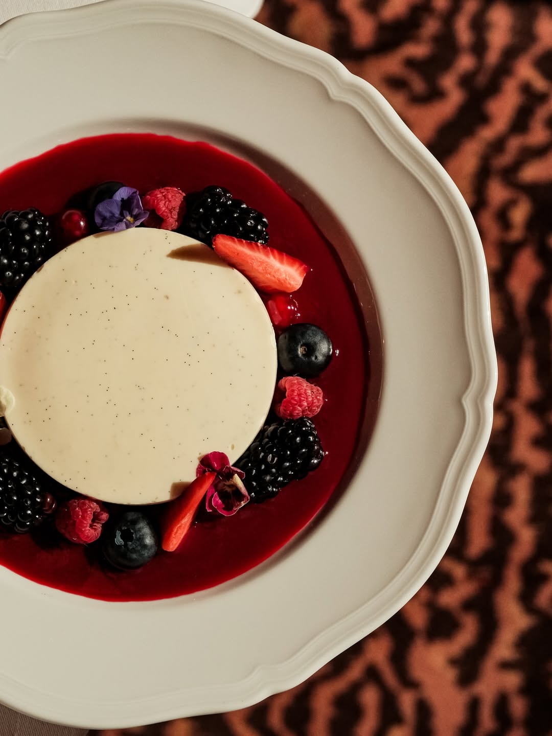 Panna cotta served with red berries at Mondaine de Pariso Istanbul