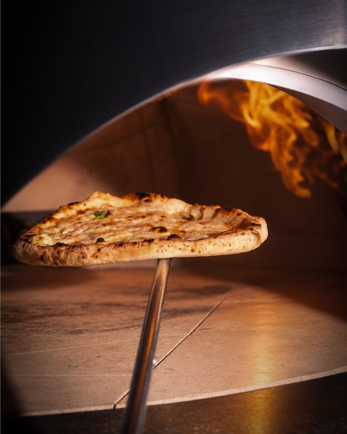 Paparino Pizza restoranının özenli iç mekânı ve atmosferi